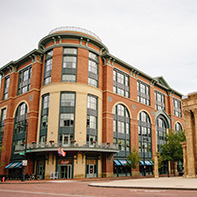 corner of street level brick office building