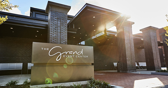 the grand event center entrance and sign